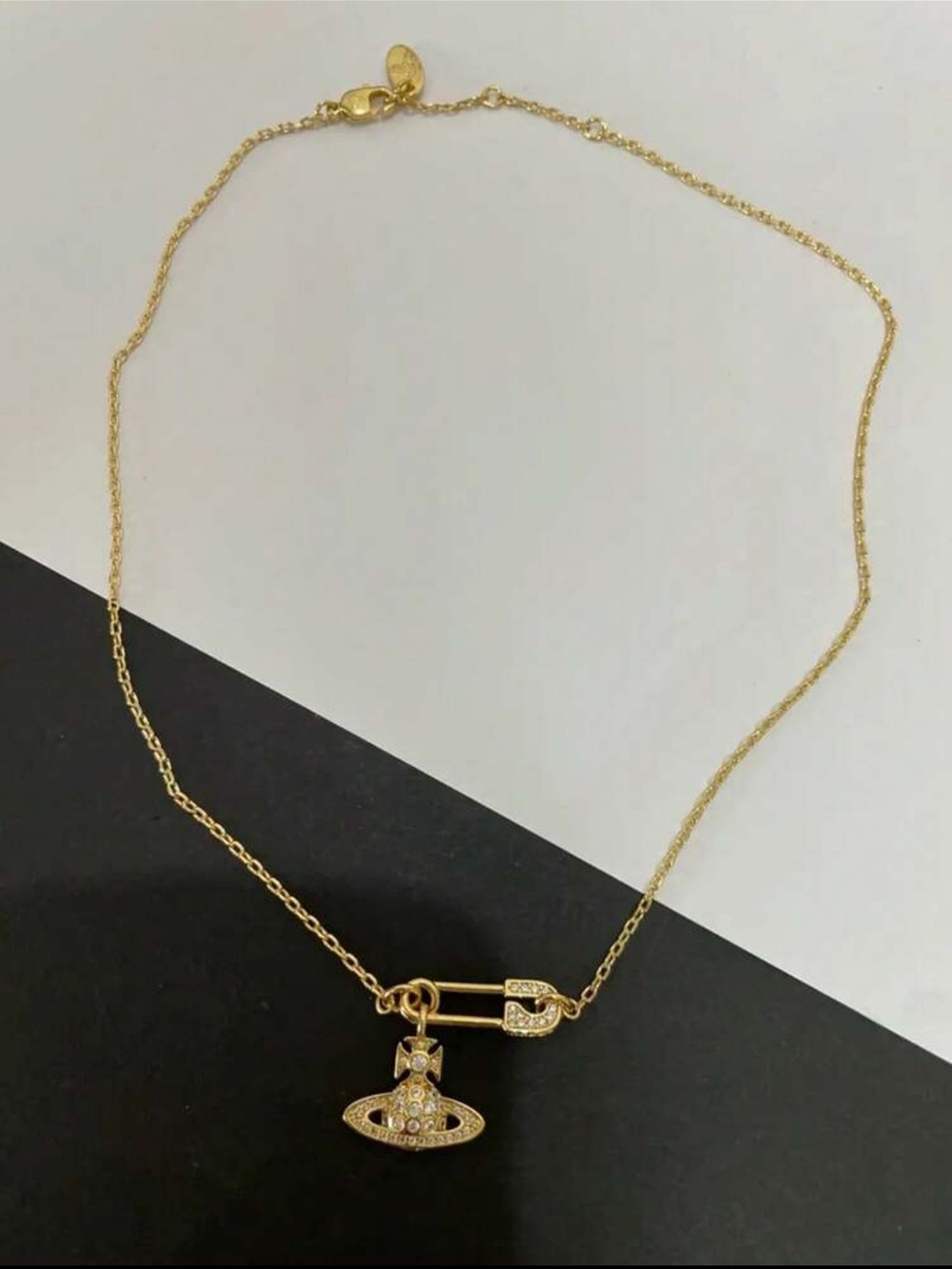 Gold Safety Pin Necklace with Crystal Orb Pendant